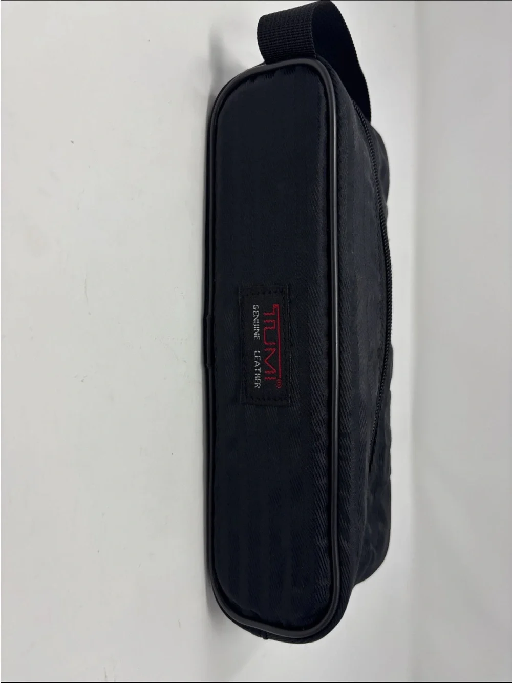 Tumi Black Travel Toiletry Pouch with Red Logo